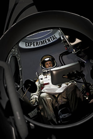 Pilot Felix Baumgartner of Austriasits in his capsule during the preparations for the final manned flight of the Red Bull Stratos mission in Roswell, New Mexico. ? Photo by AFP