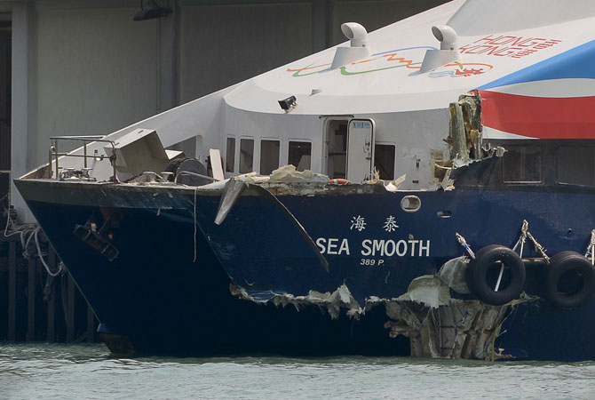 The Sea Smooth ferry with its bow badly damaged sits docked at the Lamma Island pier on October 2, 1012 following a collision with the Lamma IV boat in Hong Kong waters late on October 1. ? Photo by AFP