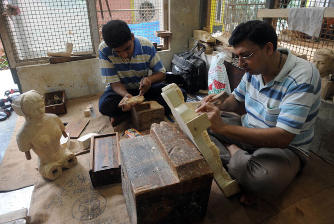 It is then recreated in wood, costing 85,000 rupees ($1,600) for a bust, or in fibreglass for a cheaper 50,000 rupees