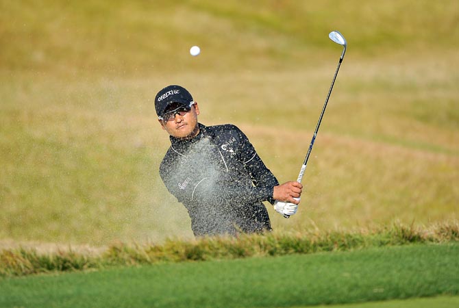This handout photo released and taken by OneAsia shows Kim Dae-sub of South Korea hitting a shot before his victory on the final day of OneAsia's Kolon Korea Open at the Woo Jeong Hills Country Club in Cheonan, south of Seoul. ?AFP Photo