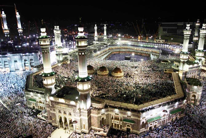 Pilgrims circle the Kaaba and pray at the Grand mosque. ? Photo by Reuters