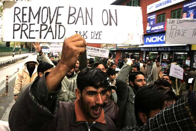 preoaid-mobile-ban-kashmir-ap-670 People in Indian-administered Kashmir protest against a ban on the use of pre-paid mobile sims in this file photo. India has, on several occasions, curbed internet and mobile phone usage in the disputed territory. – File photo by AP