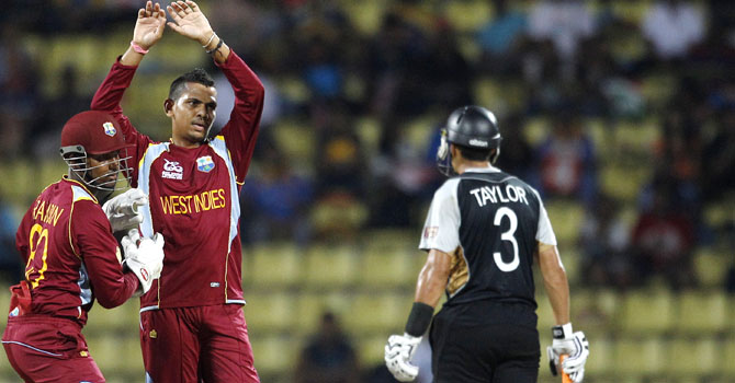 sunil-narine-west-indies-67 Sunil Narine celebrates after dismissing Jacob Oram. Narine was named man of the match – Photo by AP