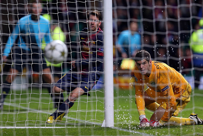 Barcelona's Argentinan striker Lionel Messi scores during their UEFA Champions League Group G football match at Celtic Park in Glasgow on November 7, 2012. Celtic won 2-1.