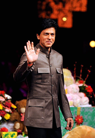 Indian Bollywood actor Shah Rukh Khan poses on the stage of television show ?India's Got Talent? to promote the Hindi film ?Jab Tak Hai Jaan?. ? AFP Photo