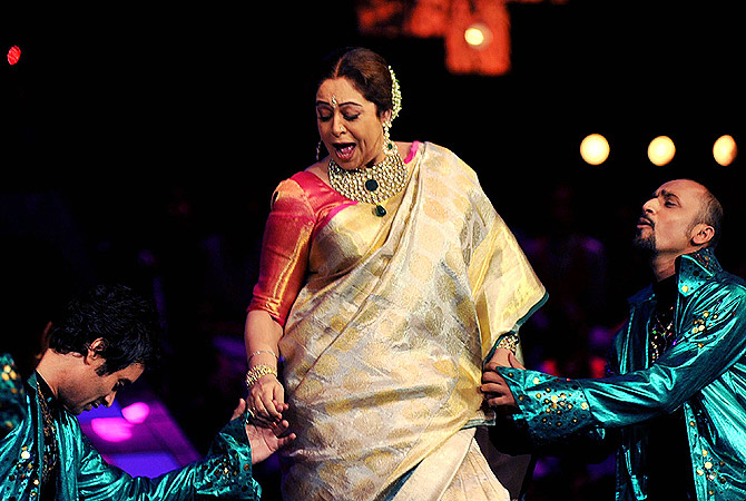 Indian Bollywood actress Kirron Kher, a judge of television show ?India's Got Talent? performs a dance routine in Mumbai . ? AFP Photo