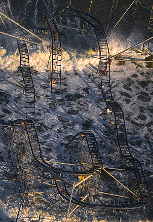 A roller coaster at the Casino Pier amusement park sits in the waters of the Atlantic in this aerial view over Seaside Heights, New Jersey, almost a month after the area was hit by Hurricane Sandy.?Photo by Reuters