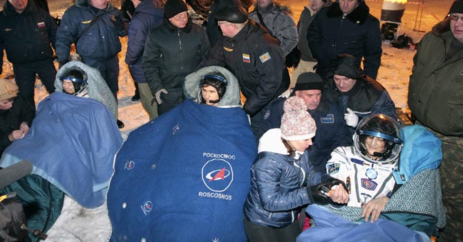 ISS crew members Hoshide, Malenchenko and Williams rest after landing near the town of Arkalyk, in northern Kazakhstan