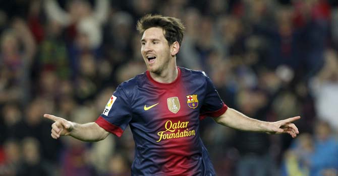 Barcelona's Lionel Messi celebrates a goal against Zaragoza during their Spanish First division soccer league match at Camp Nou stadium in Barcelona