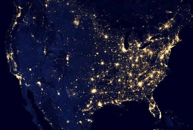A NASA handout image of the continental United States at night shows a composite assembled from data acquired by the Suomi NPP satellite in April and October 2012 and released December 5, 2012.