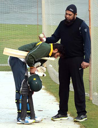 Shahid Afridi and Inzamam-ul-Haq during a batting session in the nets. ? Photo by AFP