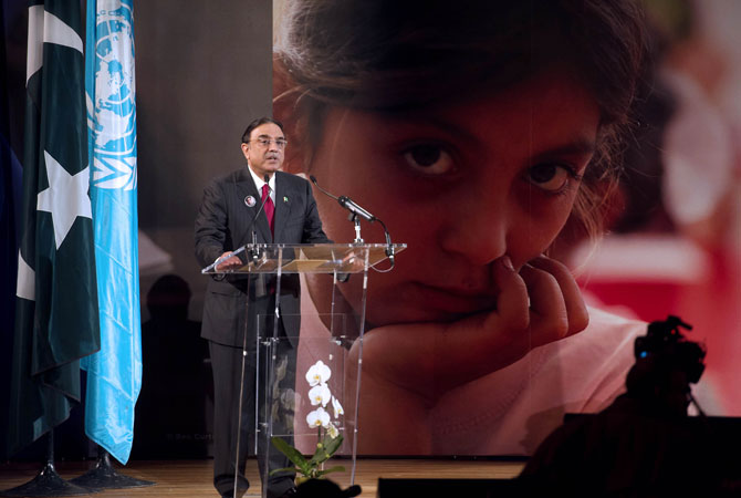 Islamic Republic of Pakistan President Asif Ali Zardari delivers a speech during the advocacy event ?Stand Up for Malala? which aims at accelerating political action to ensure girl's right to go to school worldwide, on December 10, 2012 at the Unesco headquarters in Paris. The event pays tribute to Malala Yousafazi, a 15 year old girl who survived an assassination attempt for her efforts to defend girls' education in Pakistan.