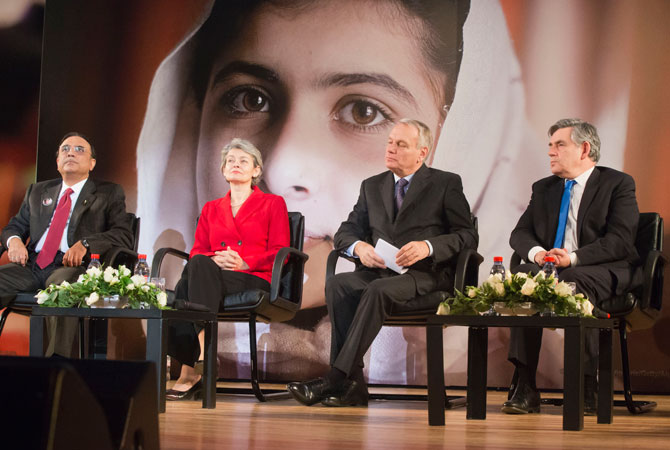 From left, Pakistan's President Ali Zardari, Secretary-General Irina Bokova, France's Prime Minister Jean-Marc Ayrault, and former British Prime Minister Gordon Brown, attend a ceremony at Unesco headquarters in Paris, Monday, Dec. 10, 2012, to honor 15-year-old schoolgirl Malala Yousafzai, who was shot in the head by a Taliban gunman, in the northwest Swat Valley in Pakistan on Oct. 9, 2012.