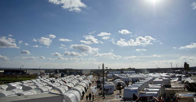 Rows of makeshift accomodation are seen in a refugee camp on the border between Syria and Turkey near the northern city of Azaz on Dec 5, 2012. The internally displaced faced further misery as heavy rain was followed by a drop in temperatures. The United Nations estimated late October that more than 2.5 million people have been affected by the fighting in Syria. There are more than 348,000 Syrian refugees registered in neighbouring countries, but many more are unregistered. - AFP Photo