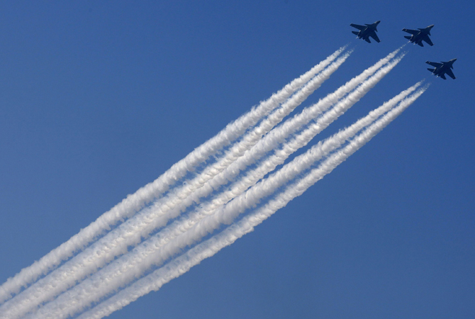 The Indian Air Force's Russian-made Sukhoi-30 aircrafts fly past during the Republic Day parade in New Delhi.