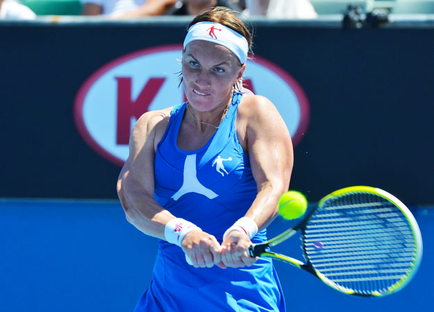 Russia's Svetlana Kuznetsova hits a return against Spain's Lourdes Dominguez Lino during their women's singles first round match