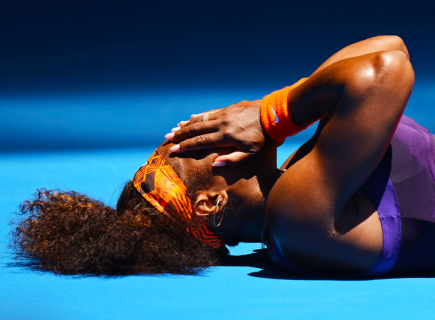 Serena Williams of the US gestures during her women's singles first round match against Romania's Edina Gallovits-Hall.