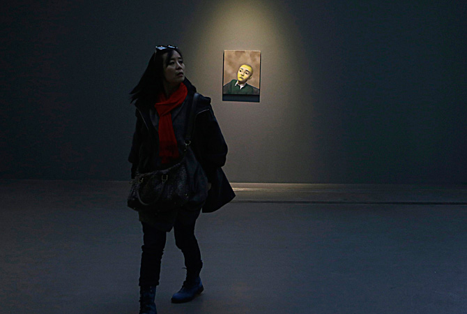 An oil painting titled 'Boy No. 2, 2012' by Chinese artist Zhang Xiaogang . ? Reuters Photo