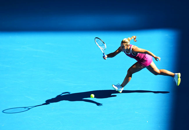 Slovakia's Dominika Cibulkova hits a return against Australia's Ashleigh Barty during their women's singles first round match.