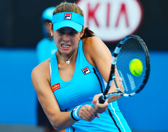 Germany's Julia Goerges hits a return against Russia's Vera Dushevina during their women's singles first round match.