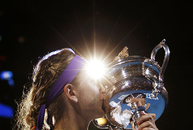 Azarenka poses with the Daphne Akhurst Memorial Cup. -Photo by Reuters