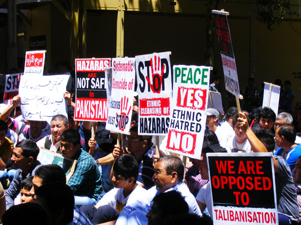 Protesters outside the Pakistani Consulate Office demand the Consulate General to come out from his office and speak. ?Photo by Sarwat Hassan for Dawn.com