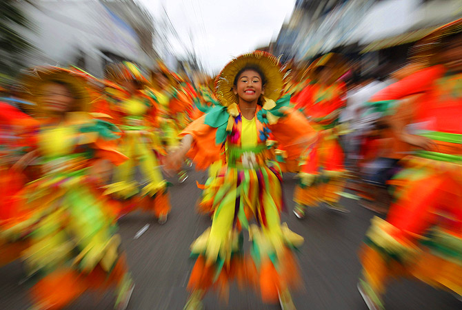 Students perform in a street dance competition during the 15th Sikhyana festival in Santa Rosa city, Laguna province, south of Manila. Locals celebrate the Sikhayan festival, a contraction of Filipino words "Sikhay" meaning diligence and "Kabuhayan" for livelihood, to recognize the spirit of enterprise, ingenuity and craftmanship of their people.?Photo by Reuters