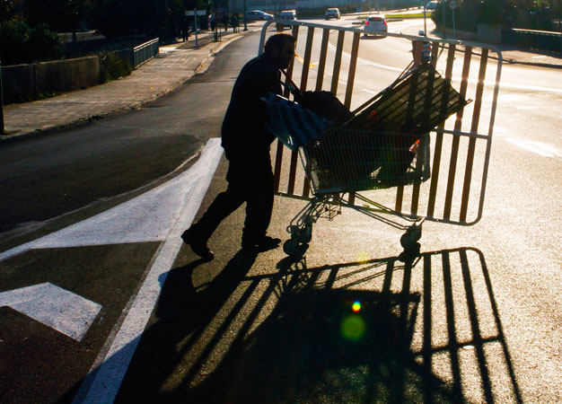 Spaniard Jose Rodriguez, 41, an unemployed construction worker who has been jobless since 2011, pushes a trolley he uses to collect scrap metal and other recyclable items from rubbish bins in Palma de Mallorca, one of Spain's major tourist islands. One in four Spaniards are out of work and Spain's economy is contracting under the weight of 60 billion euros ($79 billion) worth of budget cuts, and expected to dip 1.5 percent this year - likely to leave even more people out of work. -Photo by Reuters