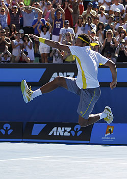 Jo-Wilfried Tsonga of France celebrates defeating Blaz Kavcic of Slovenia in their men's singles match. -Photo by Reuters