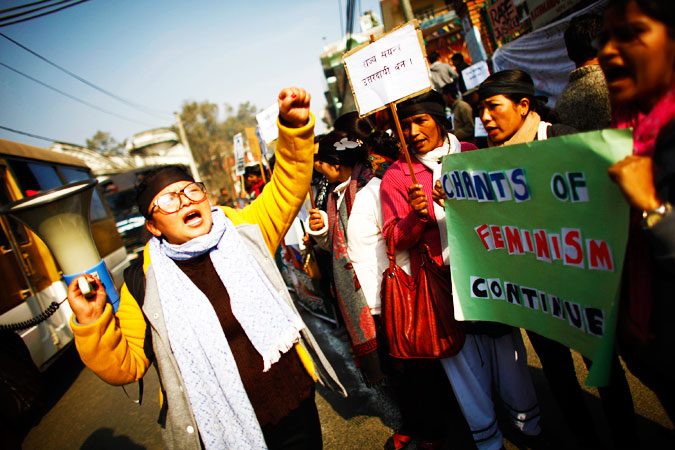 Nepalese woman participates in a protest in Katmandu, Nepal. The protesters demanded the government to crack down on crimes against women and that authorities do more to protect women in Nepal. -Photo by AP