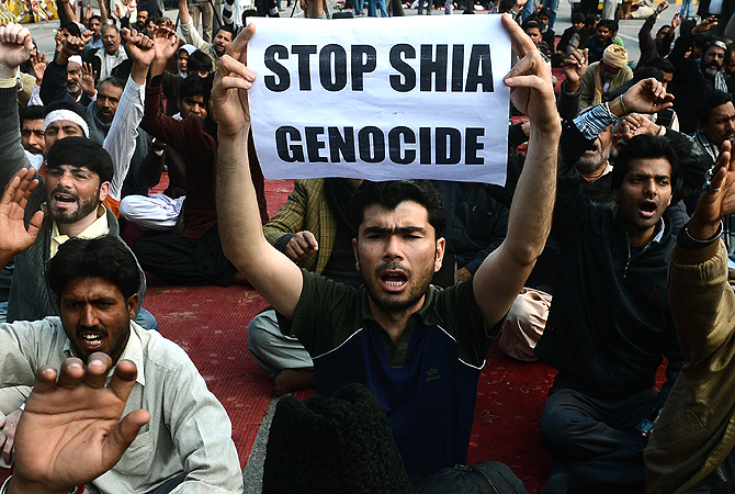 Pakistani Shia Muslim shouts slogans to protest against the bombing which killed 89 people, in Quetta on February 18, 2013. ? AFP Photo