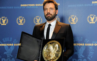 Ben Affleck poses backstage with his award for outstanding directorial achievement in "Argo" at the 65th Annual Directors Guild of America Awards. —Photo by AP