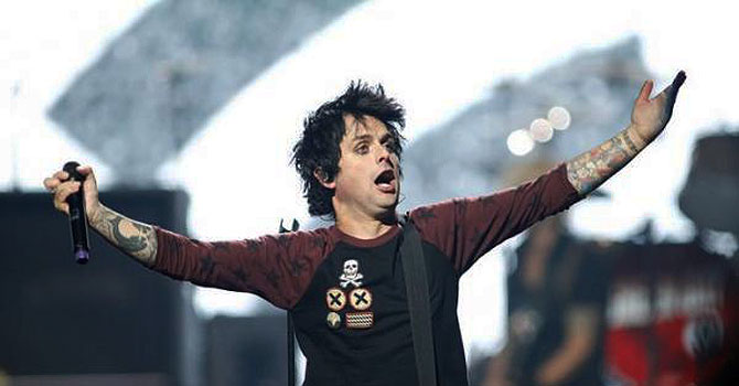 Green Day lead vocalist and guitarist Billie Joe Armstrong performing during the 2012 iHeart Radio Music Festival before the onstage rant. —Photo (File) Reuters
