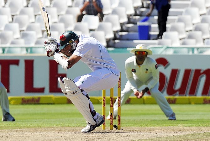 South African cricketer Hashim Amla avoids a bouncer. -Photo by AFP