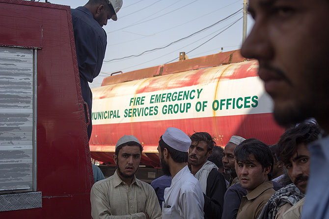 Some shopkeepers squabble with the fire department about coming late. "They showed up early today, but we needed them yesterday, and no one was here," cried Munawar Hussain, a barber.