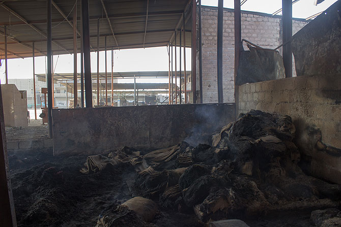 Burned jute sacks under the tin shade in New Sabzimandi. Though there were no casualties, vegetable sellers lost most of their documents and stocks in the blaze.