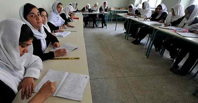 School girls studying in a classroom -Photo by AFP