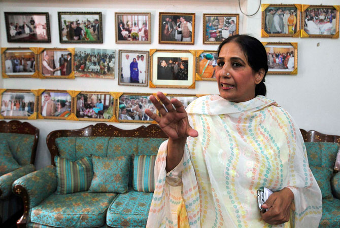 Nighat Orakzai, a Pakistan People's Party (PPP) candidate for the upcoming election, talks to Reuters journalists at her house and campaign headquarters in Peshawar.