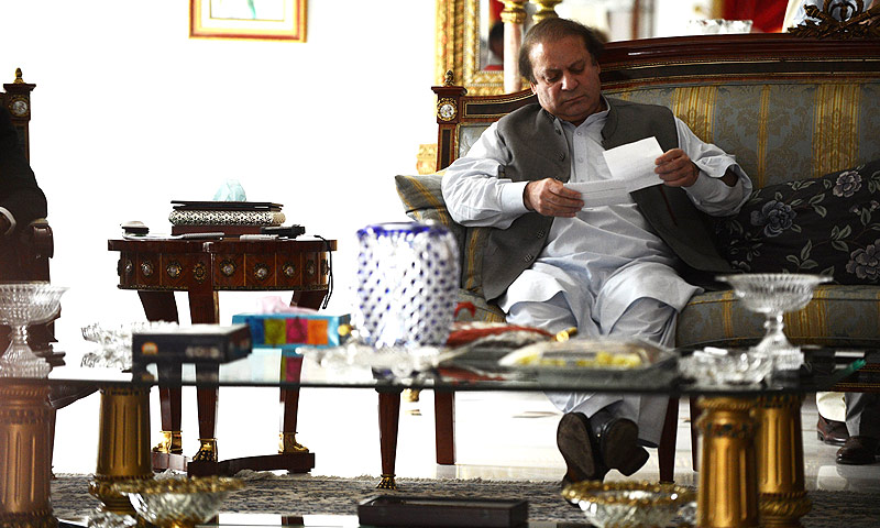 Nawaz+Sharif+House+in+Raiwind Nawaz Sharif reads notes handed to him at his farm house in Raiwind on ...