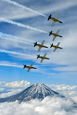 The Breitling Jet Team fly over Mount Fuji, in central Japan on Sunday, May 12, 2013. The world's only professional civilian aerobatic jet team completed their tour of Japan by visiting the Fukushima prefecture to show their support and encouragement to the people of the region still recovering from the catastrophic effects of the March, 2011, Tsunami. The team are now in transit back to Europe and will return to Asia in August. — AP Photo