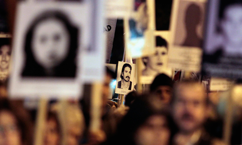 Uruguayans display pictures of relatives who "disappeared" during the military regime (1973-1985), at an annual demonstration in Montevideo May 20, 2013. Thousands of Uruguayans marched along 18 de Julio, the main avenue of the city, demanding to know about the more than 150 missing Uruguayans that they said were kidnapped by military forces. — Reuters Photo