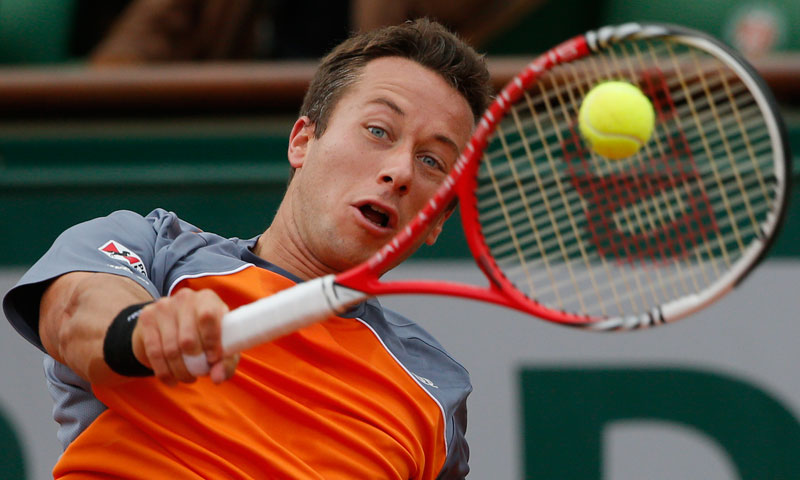 Germany's Philipp Kohlschreiber returns against Serbia's Novak Djokovic in their fourth round match at the French Open tennis tournament, at Roland Garros stadium in Paris, Monday June 3, 2013. — AP Photo