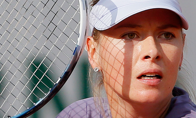 Russia's Maria Sharapova prepares to return the ball to Sloane Stephens, of the U.S, during their fourth round match of the French Open tennis tournament at the Roland Garros stadium Monday, June 3, 2013 in Paris. — AP Photo
