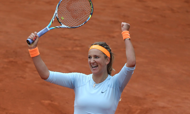 Victoria Azarenka of Belarus celebrates as the ball goes out, defeating Italy's Francesca Schiavone in two sets 6-3, 6-0, their fourth round match at the French Open tennis tournament, at Roland Garros stadium in Paris, Monday June 3, 2013. — AP Photo