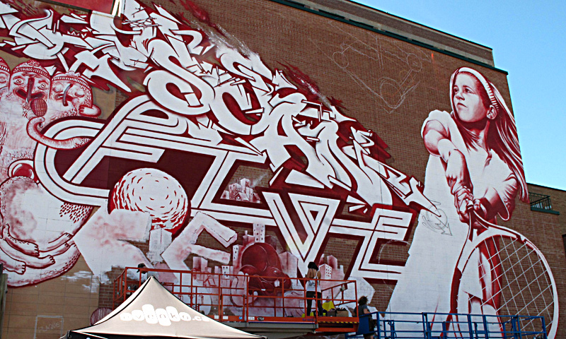 A mural is seen on the side of a building during the Mural Festival on June 6, 2013 in Montreal, Canada. The festival is the first of its kind in Canada, an open-air museum featuring work by some 35 artists from around the world. — AFP Photo