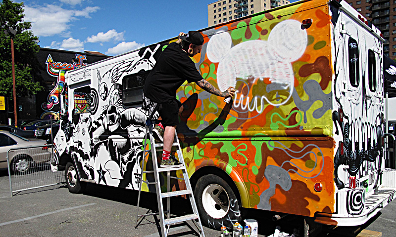 A mural in progress is seen on the side of a van during the Mural Festival on June 6, 2013 in Montreal, Canada. The festival is the first of its kind in Canada, an open-air museum featuring work by some 35 artists from around the world. — AFP Photo