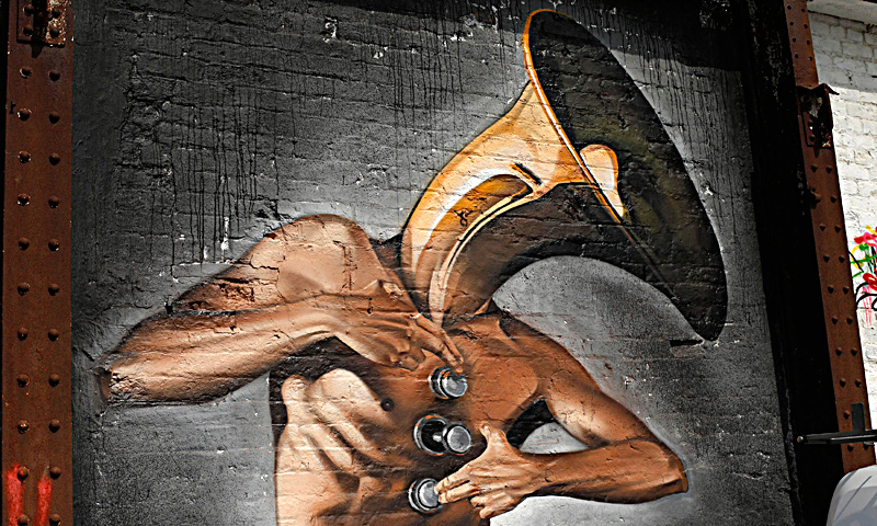 A mural is seen painted on a wall in Blackpool, northern England June 18, 2013. The mural is part of the "Sand, Sea and Spray" outdoor art festival, which has seen 40 urban artists from around the world paint murals on buildings across the town centre. — Reuters Photo