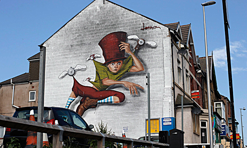 A mural is seen on a wall in Blackpool northern England, June 18, 2013. The mural is part of an outdoor art festival, "Sand, Sea and Spray" which has seen 40 urban artists from around the world paint murals on buildings across the town centre. — Reuters Photo