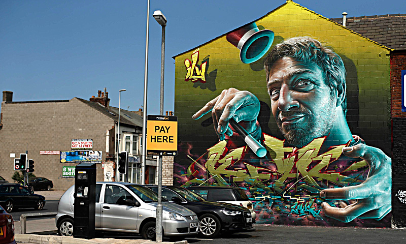 A mural is seen on a wall in Blackpool northern England, June 18, 2013. The mural is part of an outdoor art festival, "Sand, Sea and Spray" which has seen 40 urban artists from around the world paint murals on buildings across the town centre. — Reuters Photo