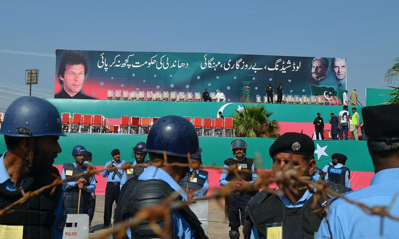 Security personnel guarding the stage at D-Chowk — Photos by Irfan Haider